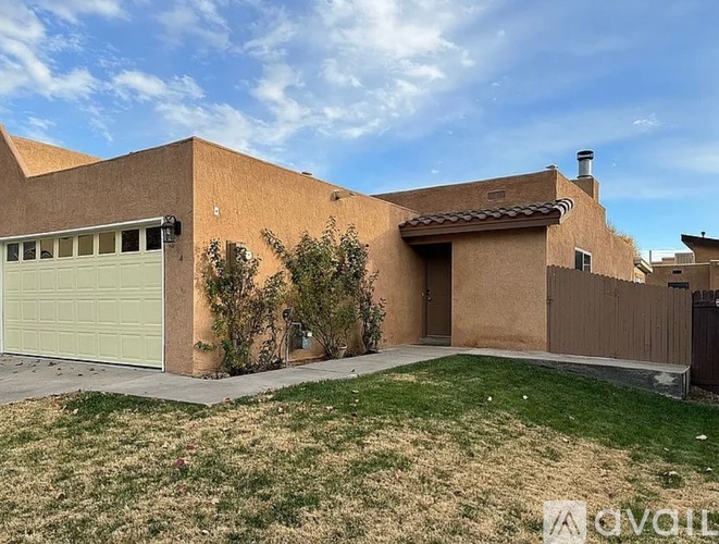 A house with a garage and a driveway.