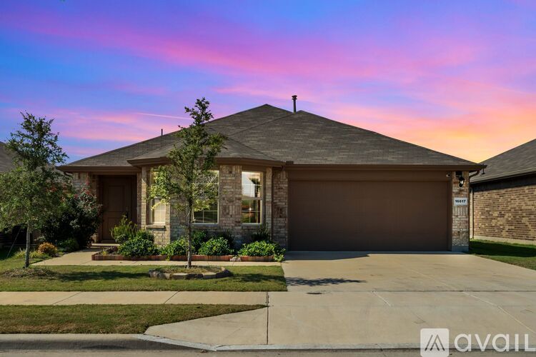 A house with a brown garage door is for sale.