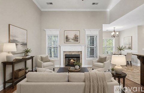 A living room with a fireplace and a couch.