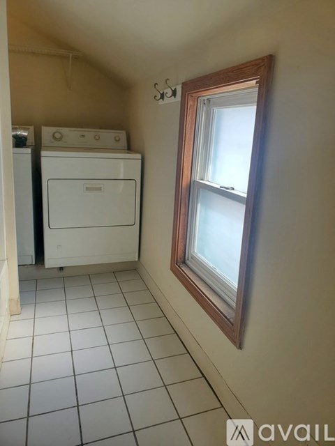 A laundry room with a washer and dryer.