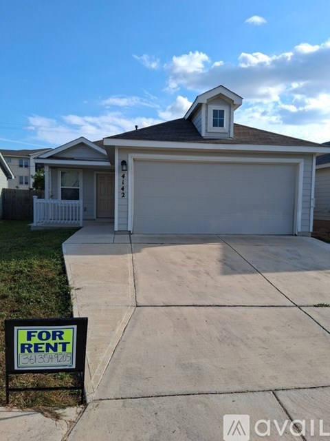 A house with a garage is for rent.