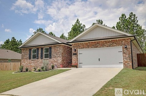 A house with a garage is for sale.