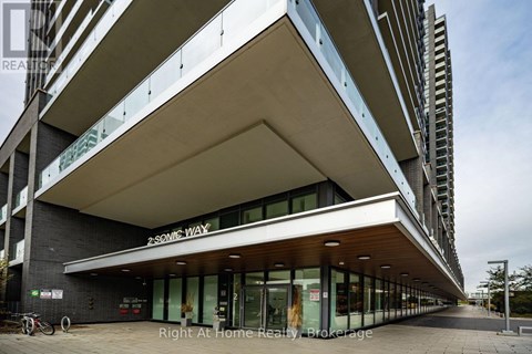 A modern building with the name "ZSONIC WAY" on the front.