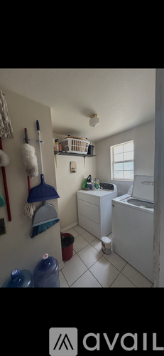 A small bathroom with a white toilet and a white sink.