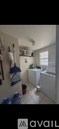 A small bathroom with a white toilet and a white sink.