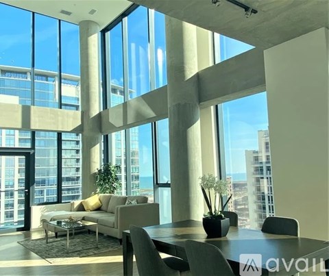 A modern living room with a view of the city.