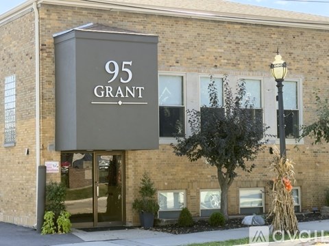 The front of a building with a sign that says 95 GRANT.