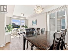 A dining room with a wooden table and chairs.