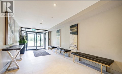 A modern living room with a bench and a table.