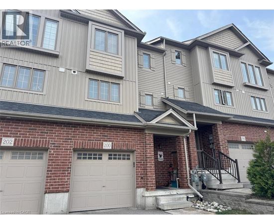 A two-story residential building with a garage on the ground floor.