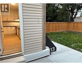 A realtor sign is on the front door of a house.
