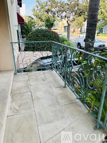 A car crashed into a fence on a residential street.