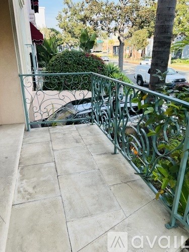 A car crashed into a fence on a residential street.