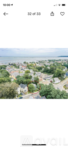 A bird's eye view of a residential area with houses and trees.