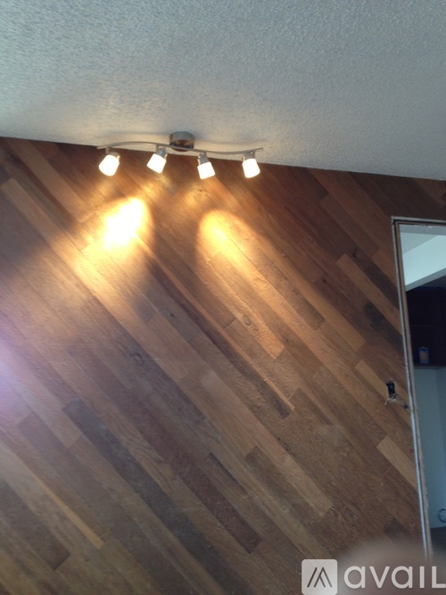 A wooden floor with lights on it.