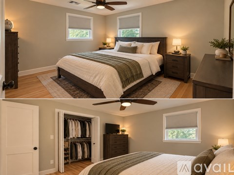 A bedroom with a large bed and a closet with clothes hanging.