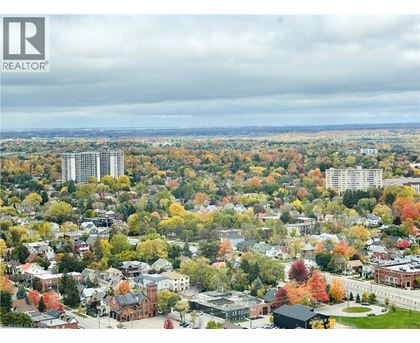 A cityscape with a mix of residential and commercial buildings.