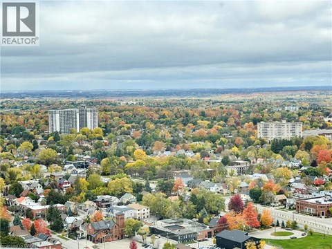 A cityscape with a mix of residential and commercial buildings.