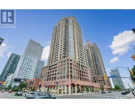 A tall building with a sign that says "Royal" on it.