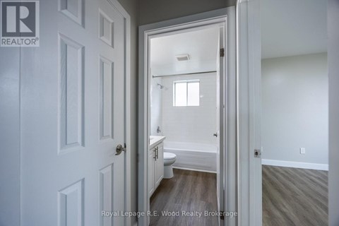 A white door with a Royal LePage logo on it.