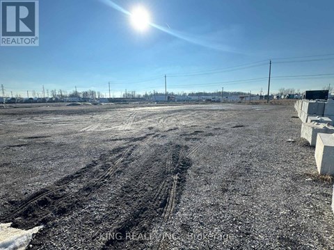 A sunny day at a construction site with a clear blue sky.