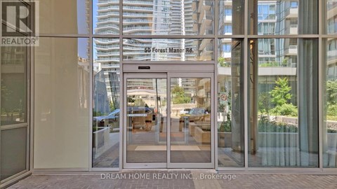 The image shows the entrance to a realty office named Dream Home Realty Inc.