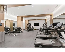 A gym with treadmills and exercise equipment.