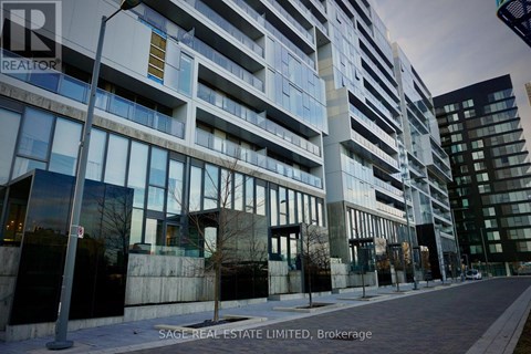 A modern building with glass windows and a sign that reads "SAGE REAL ESTATE LIMITED, Brokerage".