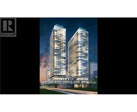 A modern building with a glass facade is depicted in the image.