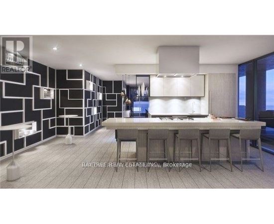 A modern kitchen with a dining table and bar stools.