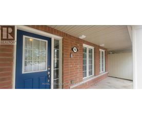 A blue door with a glass window is on the left side of the image.