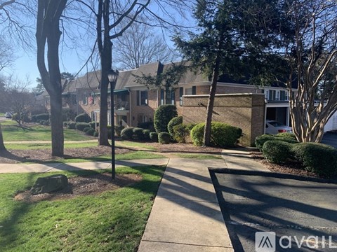 A residential area with houses and trees.
