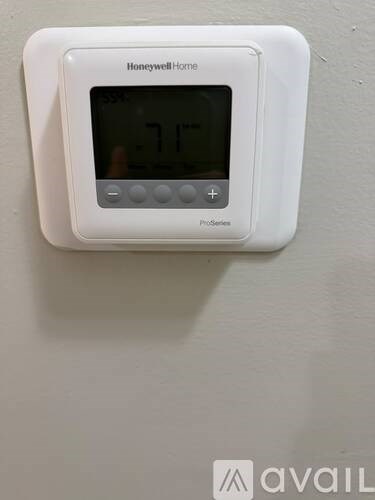 A Honeywell Home thermostat is set to 71 degrees.