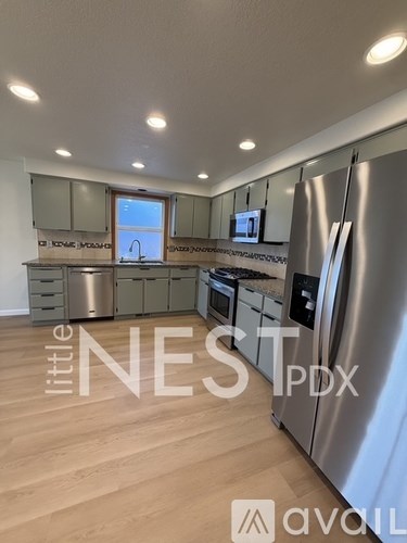6196 SE Heike St 4 Beds Apartment for Rent