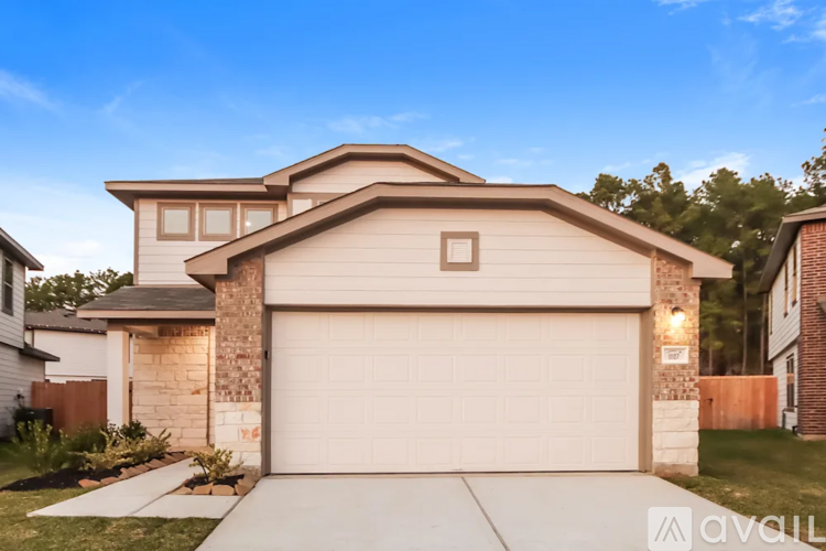 A house with a garage is available for sale.