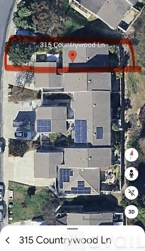 An aerial view of a building at 315 Countrywood Lane with a red outline.