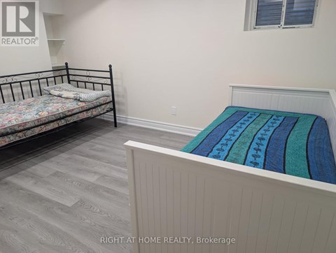 A bedroom with a bed and a bunk bed.