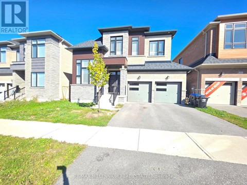 A row of houses with a sign that says REALTOR.