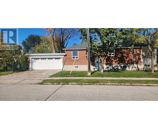 A house with a garage is for sale.