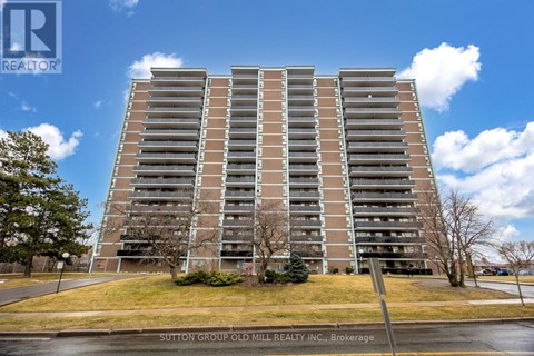 A tall apartment building with a sign that says Sutton Group Old Mill Realty, Brokerage.