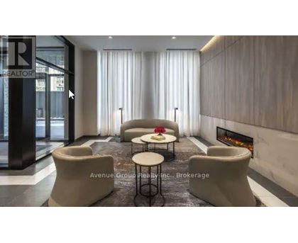 A modern living room with a fireplace and a dining table.