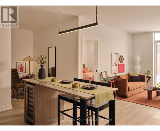 A well-lit, modern living room with a dining area in the foreground.