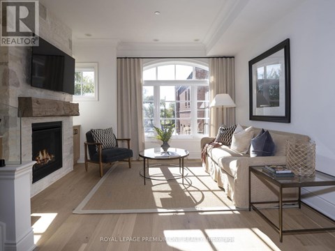 A living room with a fireplace and a couch.