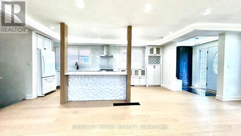 A realtor photo of a spacious empty house.