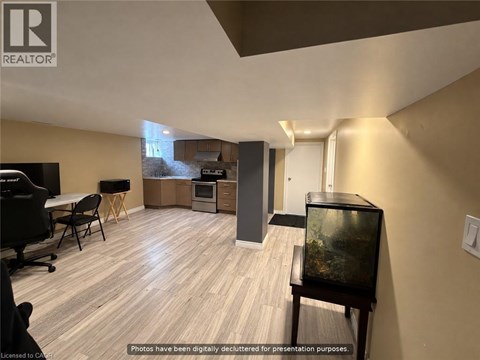A living room with a television and a fish tank.
