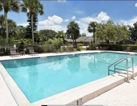 A swimming pool with a 8 ft depth marker.