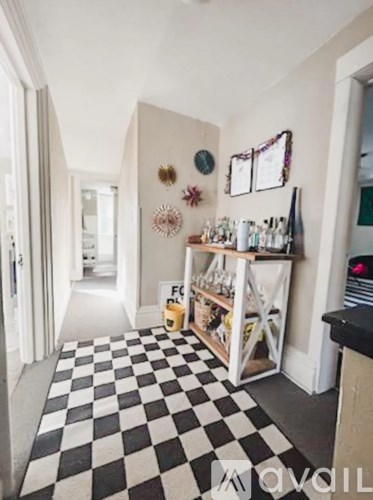 A black and white checkered floor in a room.