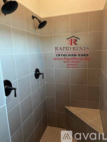 A shower area with Rapid Rent's Property Management Inc. logo and contact information.