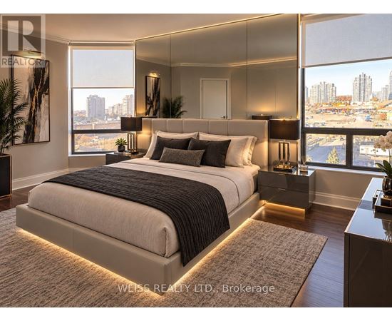 A bedroom with a large bed and a view of the city.