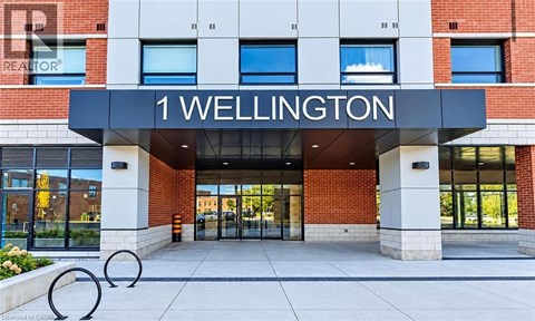 The front of a building with the name "1 Wellington" on it.